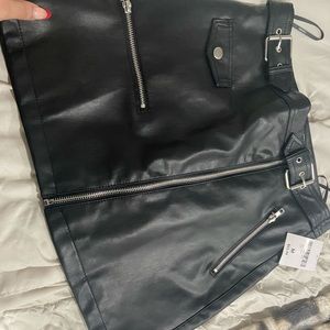 Faux leather skirt never been used as seen.